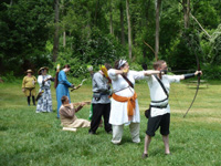 archers on the line for the charging bulls shoot