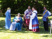 Queen Fortune and Her attendants enjoy the shade.